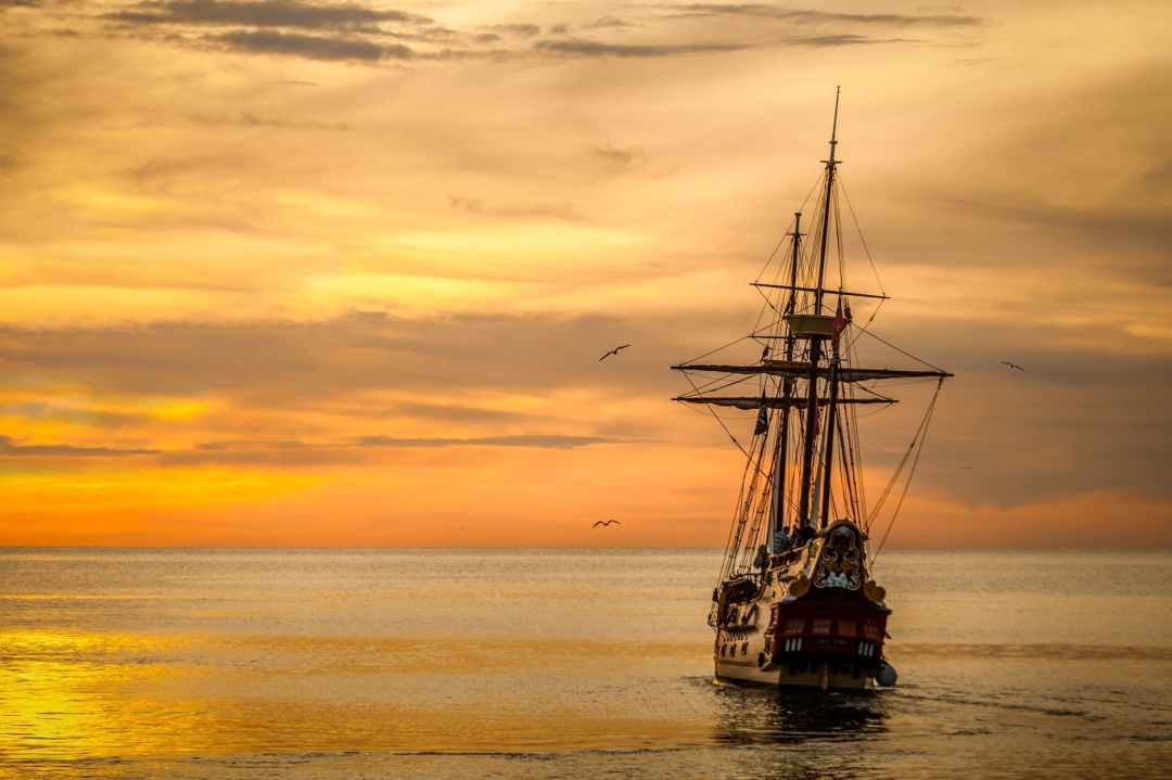 sail ship at see during sunset - jan vrabec - sparrow's english reader - level 1 English for beginners