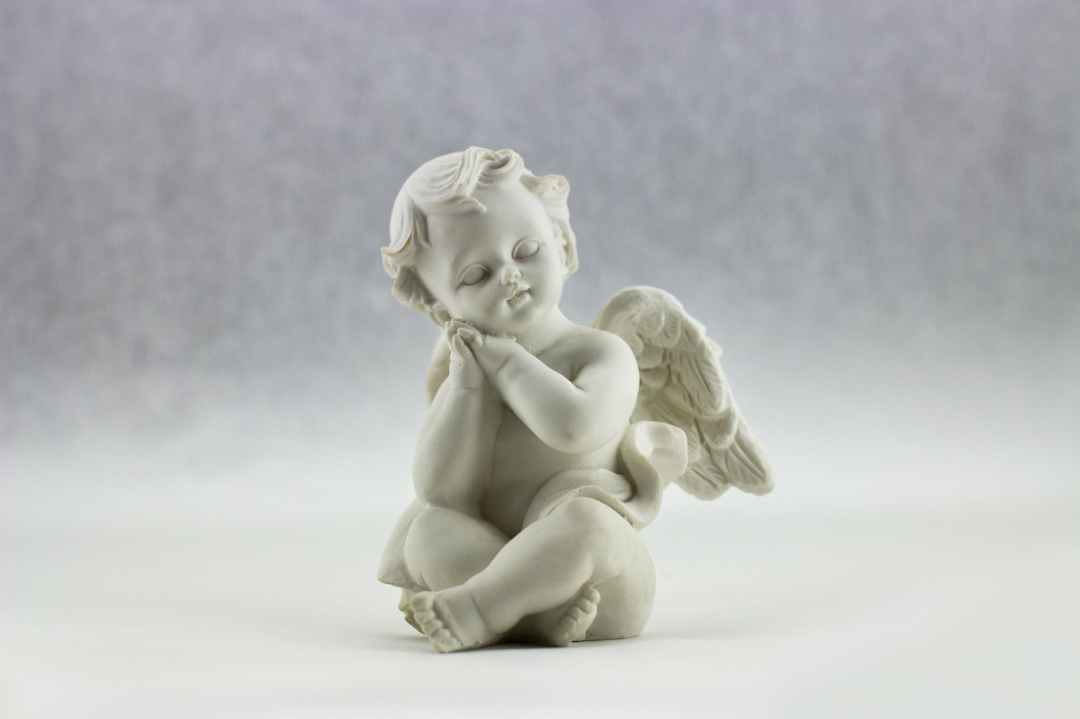 a little white statue of an angel - jan vrabec - Sparrow's English Reader - L-3 English